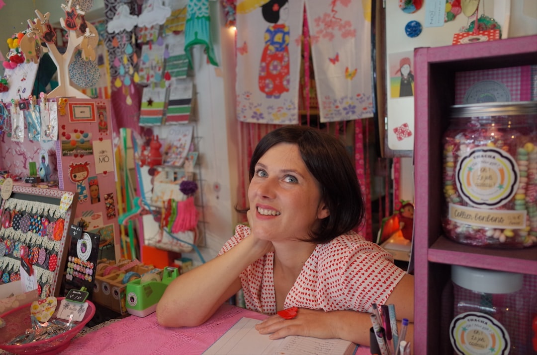 Happy small business owner inside their shop